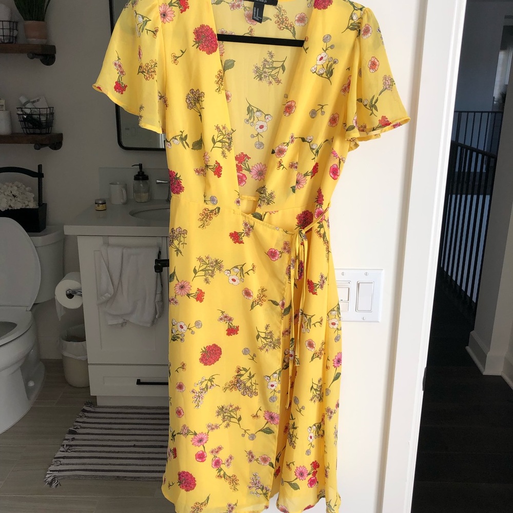yellow wrap dress.